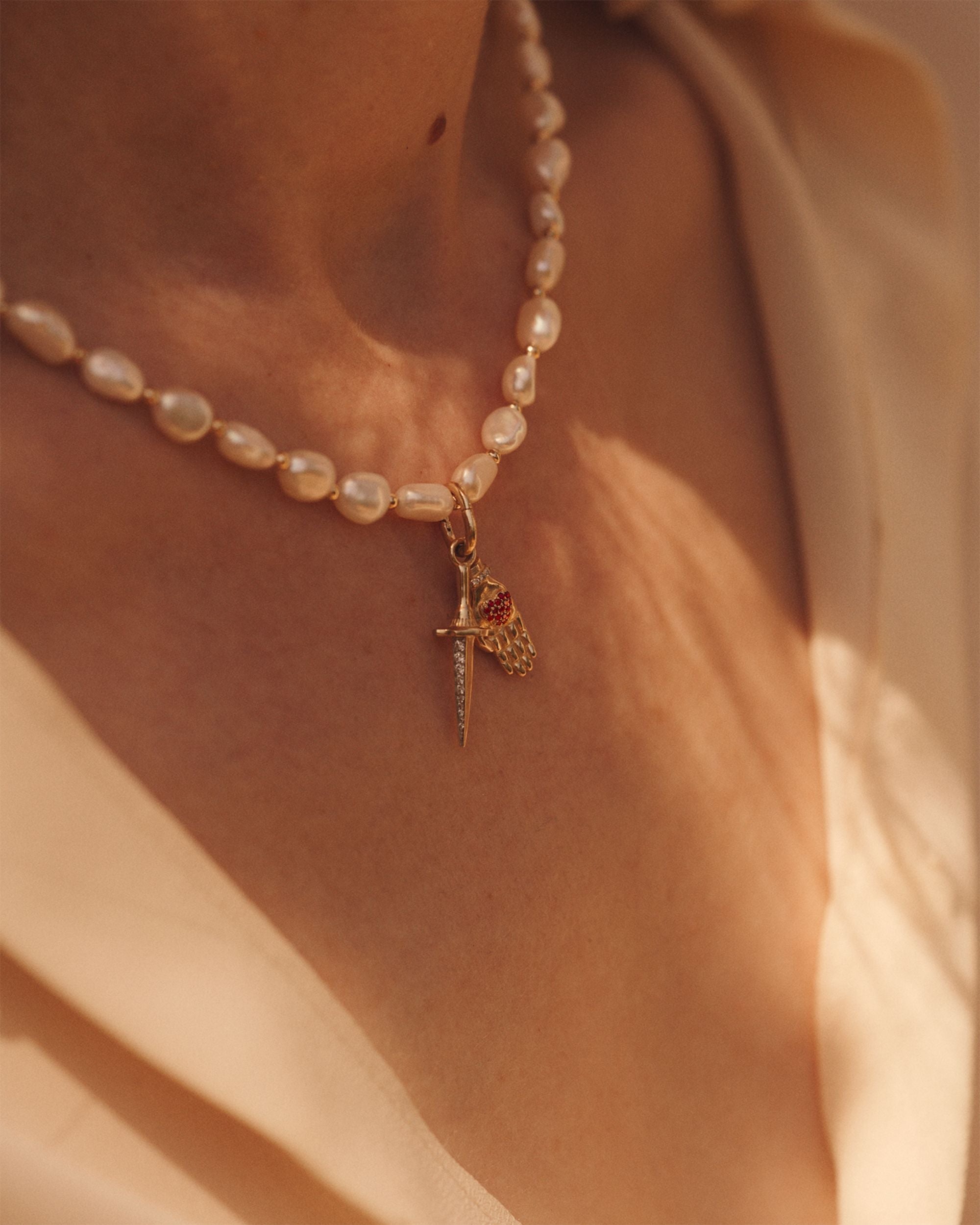 Heart in Hand 14K Gold Ruby and Diamond Pendant