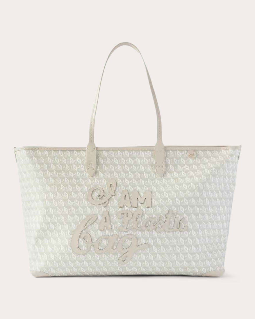 I am a Plastic Bag Appliquéd Leather-Trimmed Recycled Canvas Tote